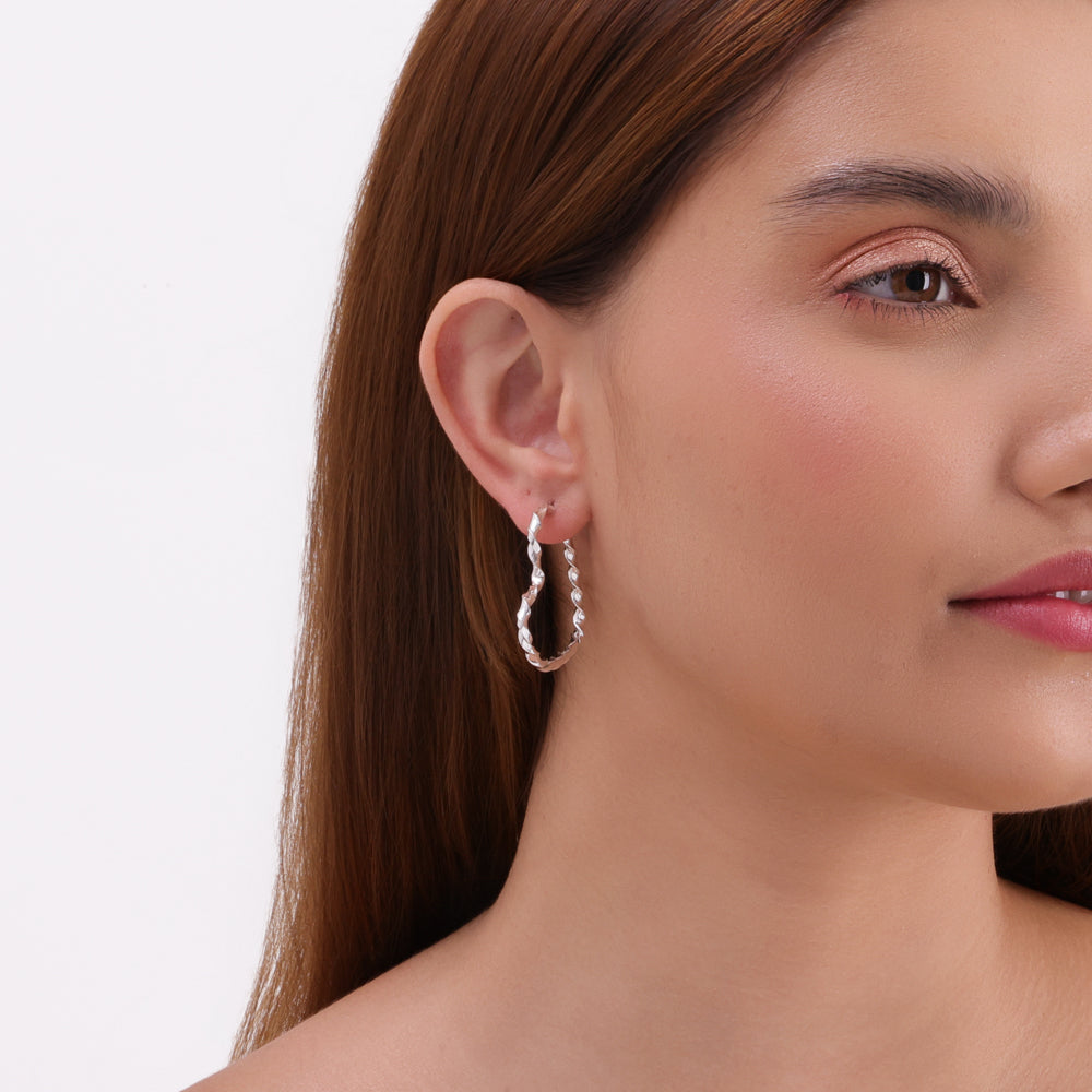 Ohrringe mit gedrehtem Herz